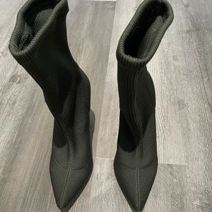 Steve Madden heavy knit bootie with chunky heel. Color is ARMY GREEN.